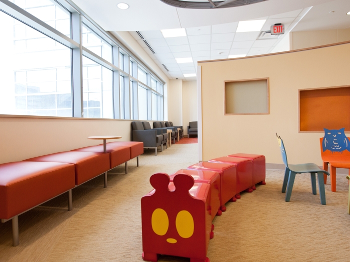 empty waiting room with colorful benches