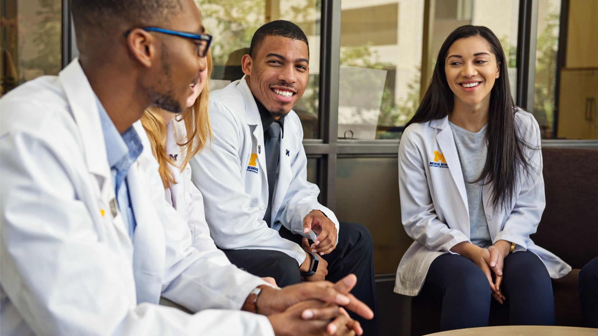 Medical students sitting together talking