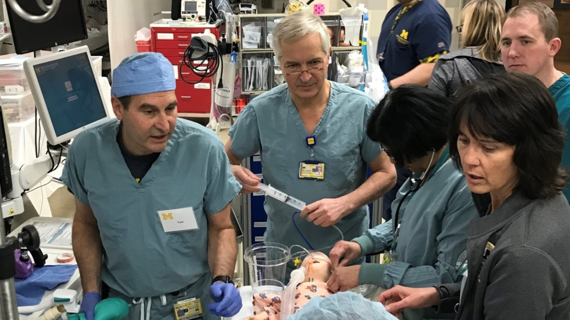 Anesthesiology team collaborating in lab