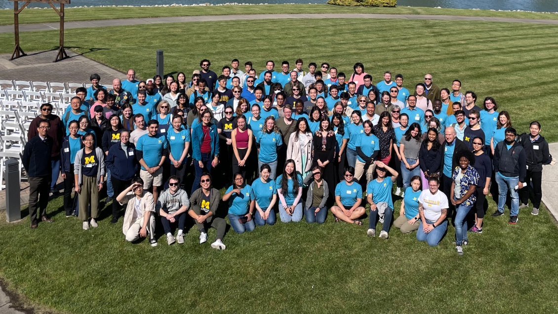 a group of people posing for a photo