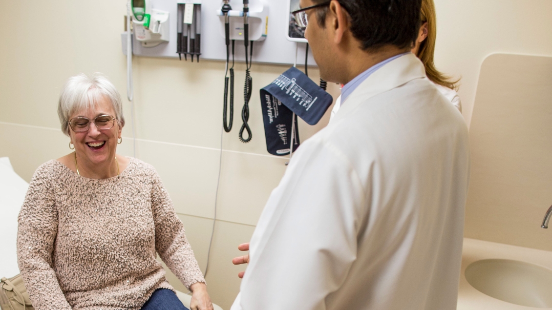 a doctor talking to a patient