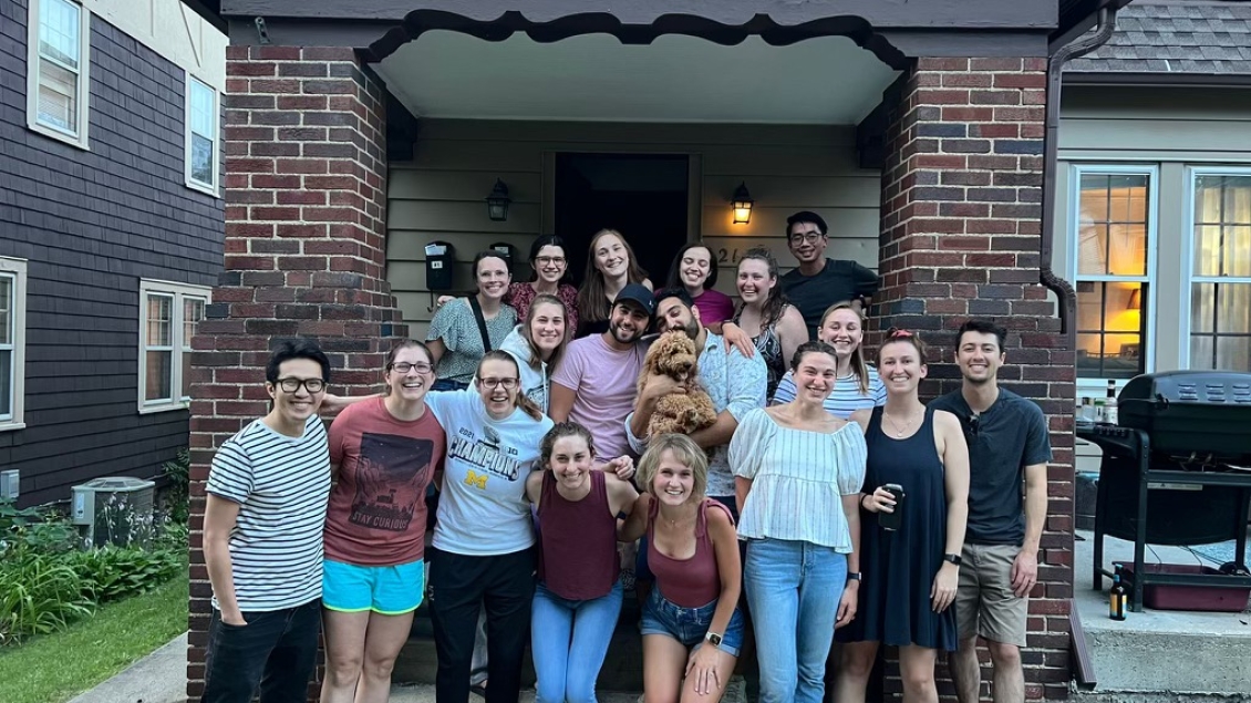 Providers smile for a photo outside in the summer