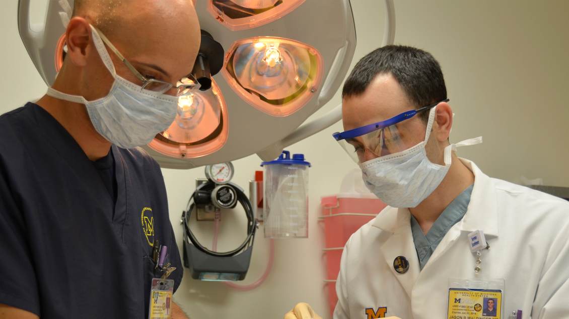 doctors operating on patient 