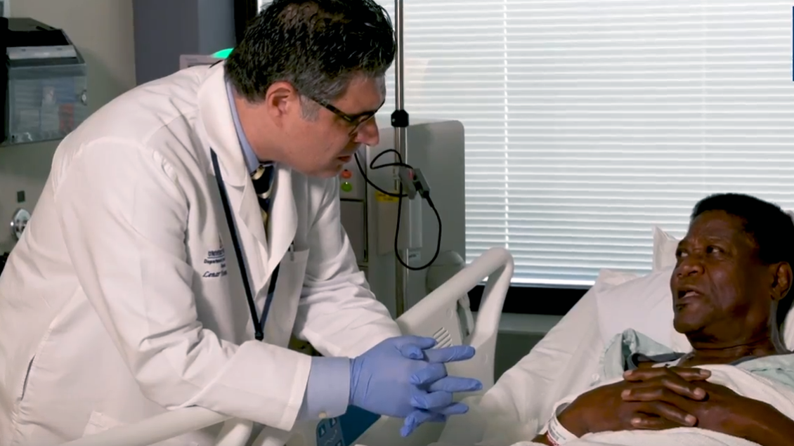 A doctor working with a patient