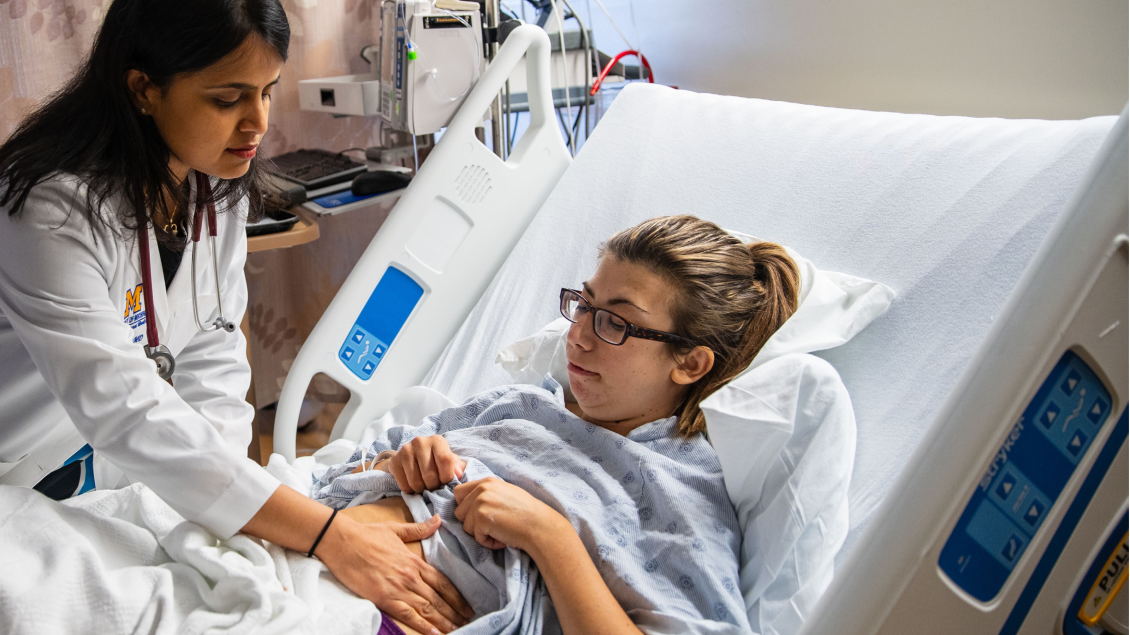 A doctor working with a patient