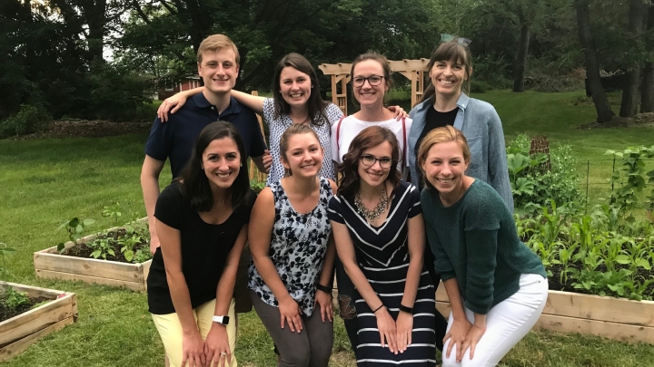 Med Peds class of 2022 smile for a photo outside