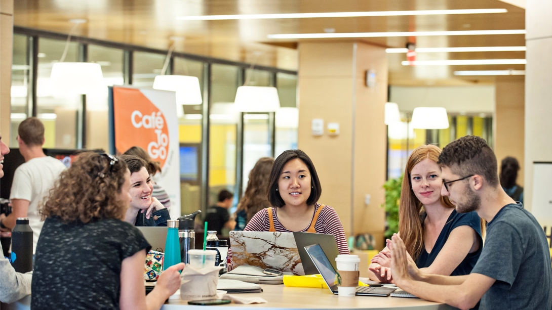 A group of students at a table working together