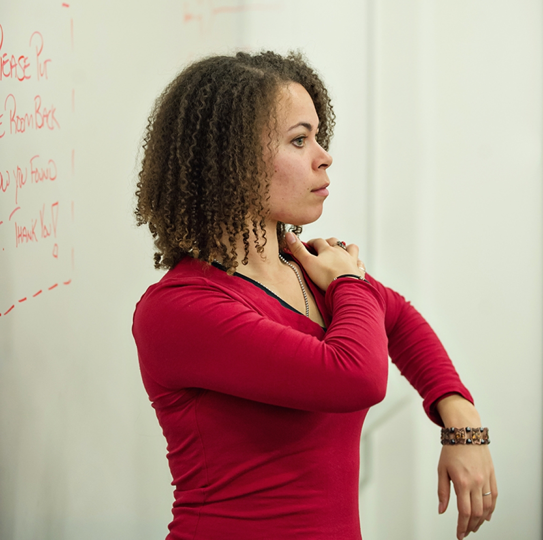 Woman holding showing in lecture class