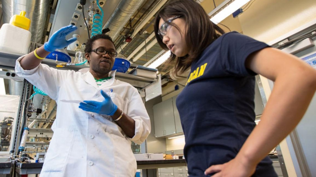 Two people working in a lab