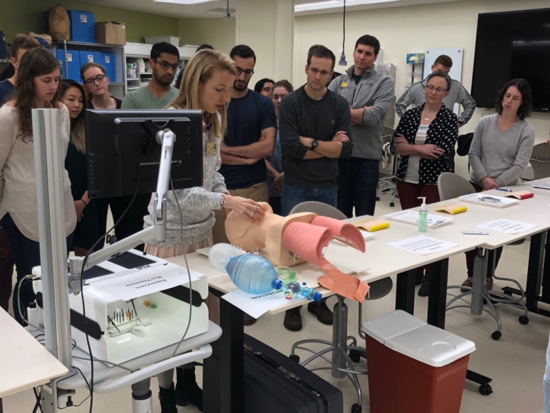 Students watching a demonstration by provider