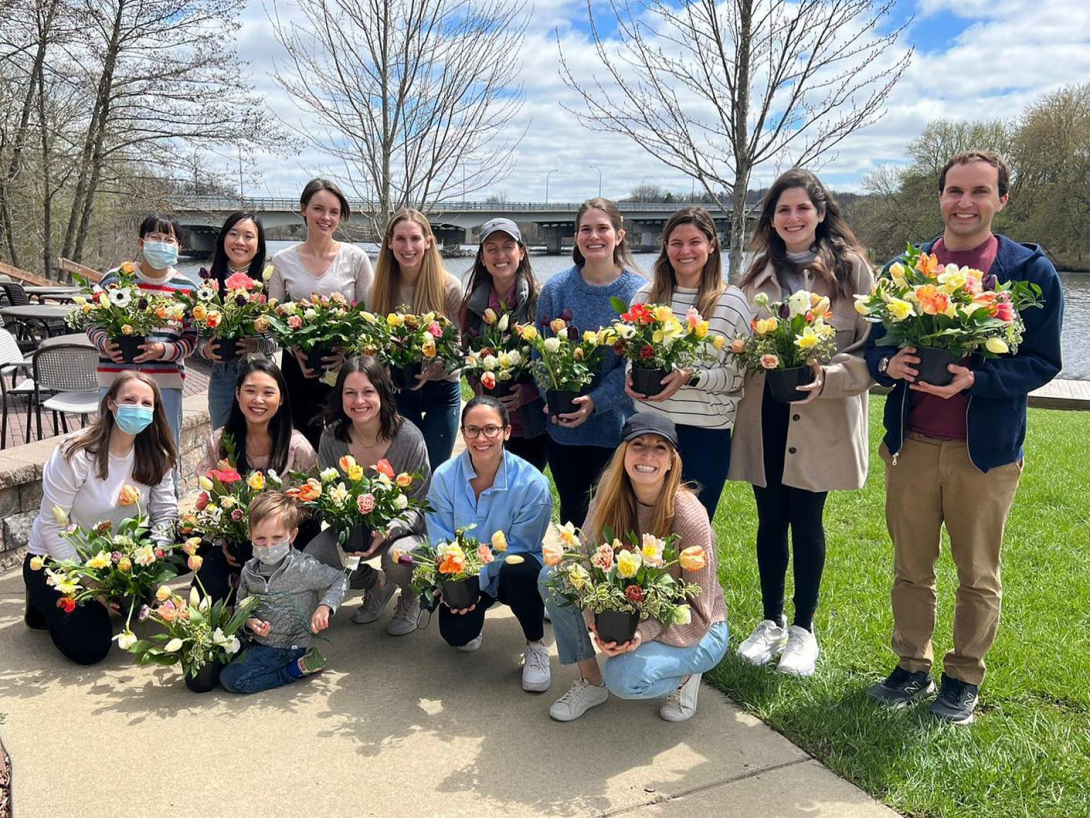 resident planting tulips for wellness retreat day 