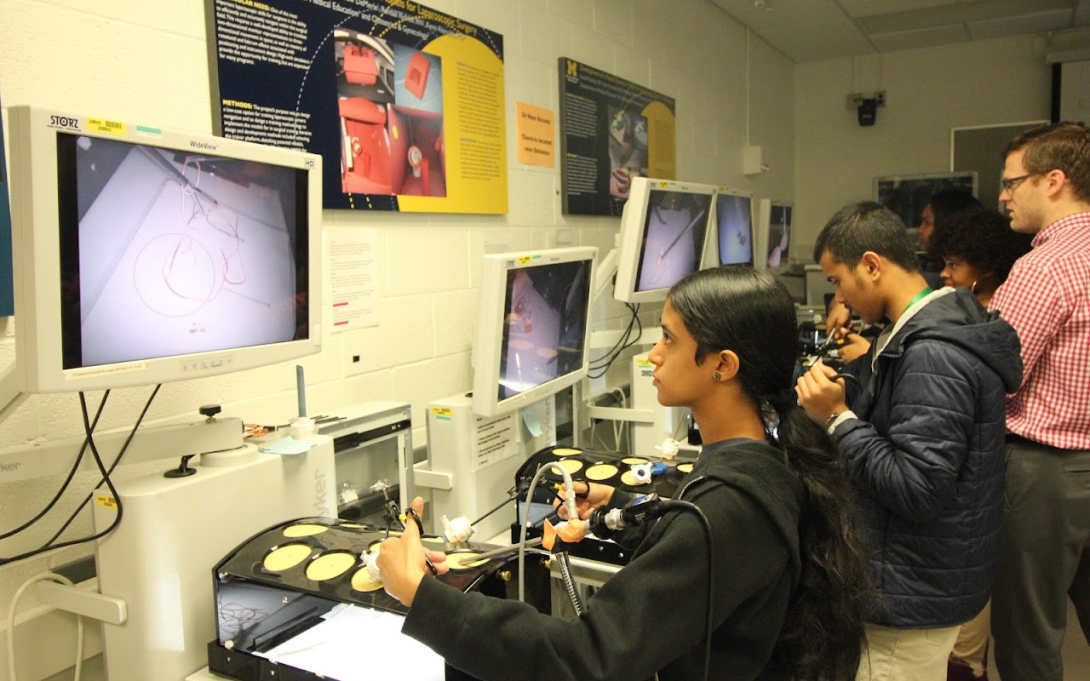 Students in a tech lab using equipment